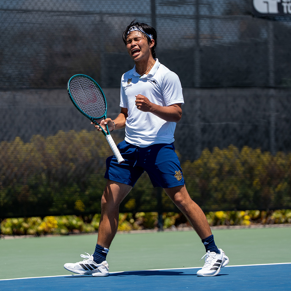 Andy Nguyen celebrates a key moment during the 2025 Big West Conference Championships at Barnes Tennis Center.