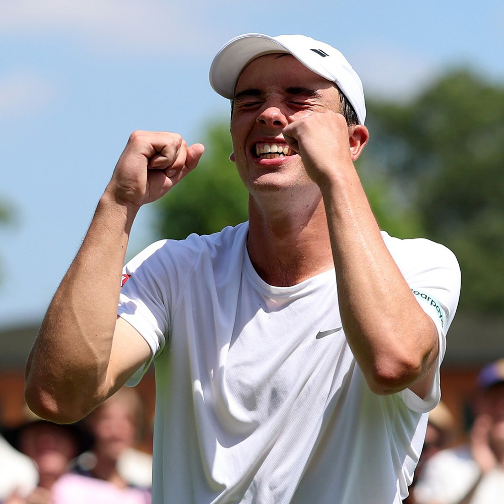 Oliver Tarvet celebrates his first round match at Wimbledon