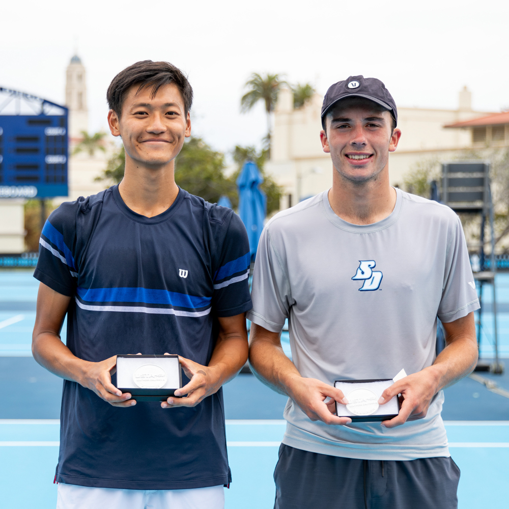 Oliver Tarvet and Leo Vithoontien smiling with trophies at USD