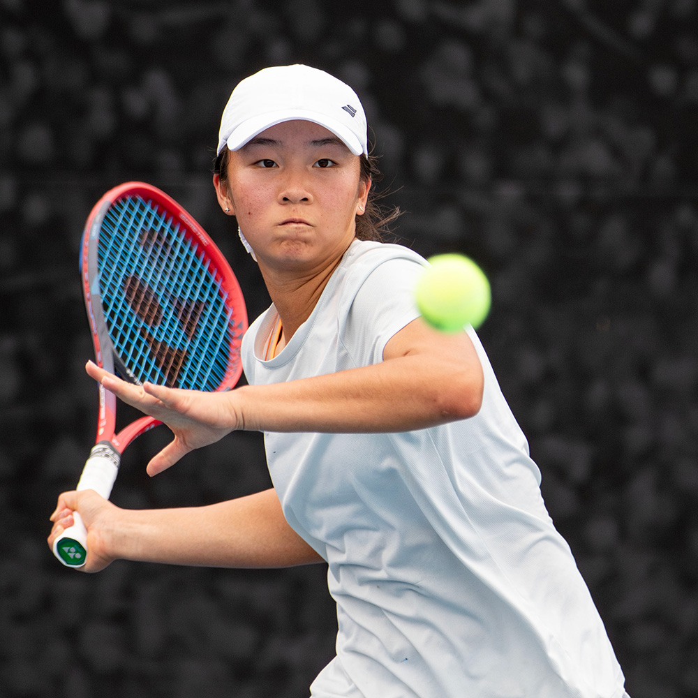 Yilin Chen hits a forehand during her tennis match at University of San Diego