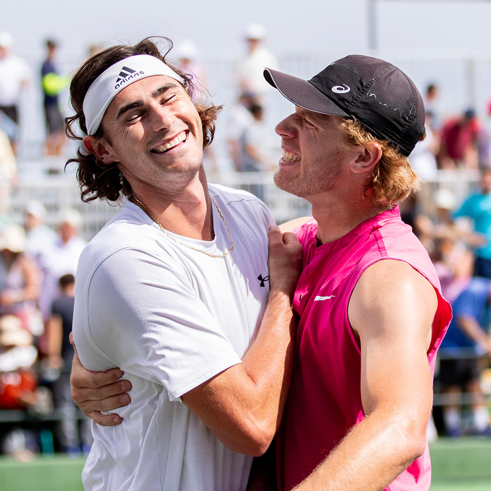 Patrik Trhac and Ryan Seggerman hug after winning their first round match at the 2024 BNP Paribas Open