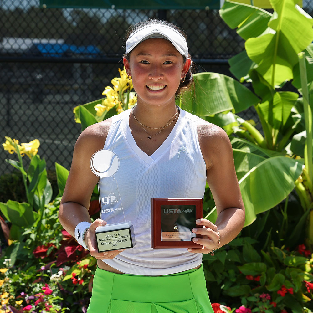Nicole Weng smiles with the USTA Gold Ball after winning the Girls’ 18 Singles title at the USTA National Clay Court Championships in Mount Pleasant, South Carolina.