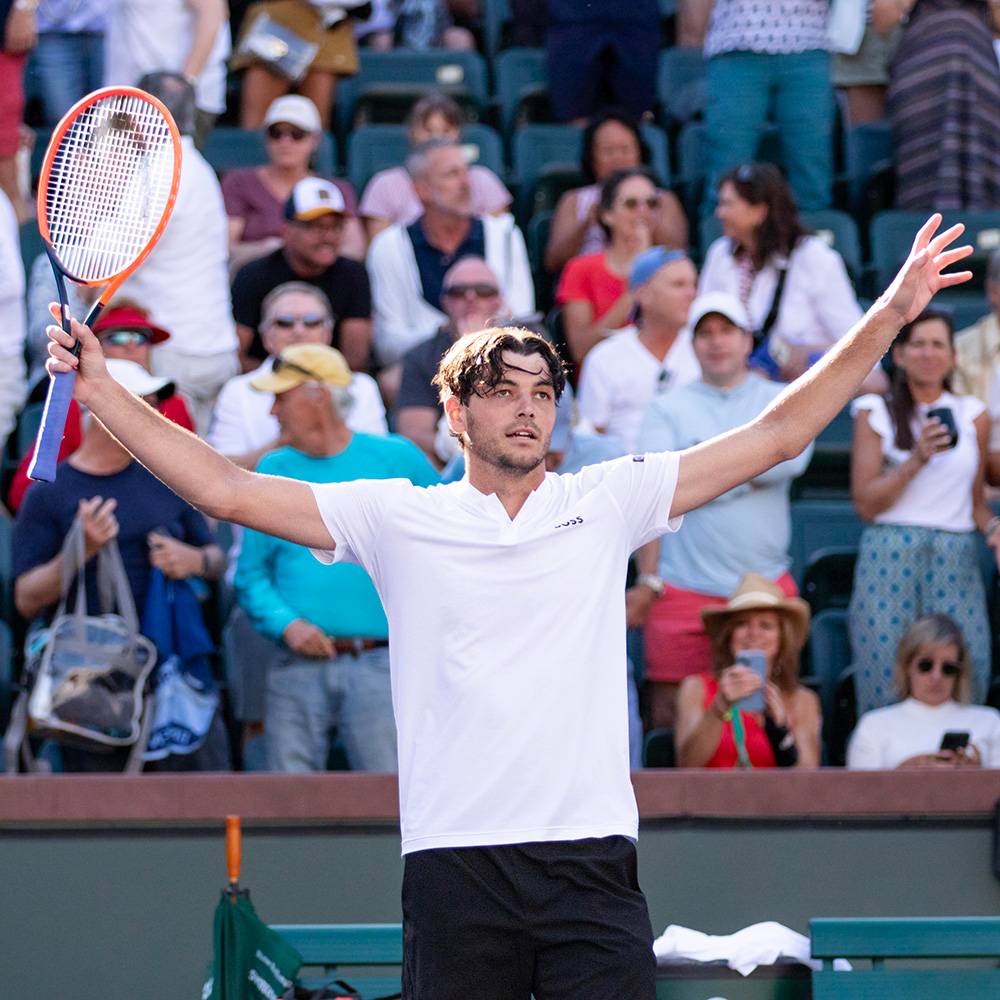 taylor fritz celebrates winning his match at bnp paribas open