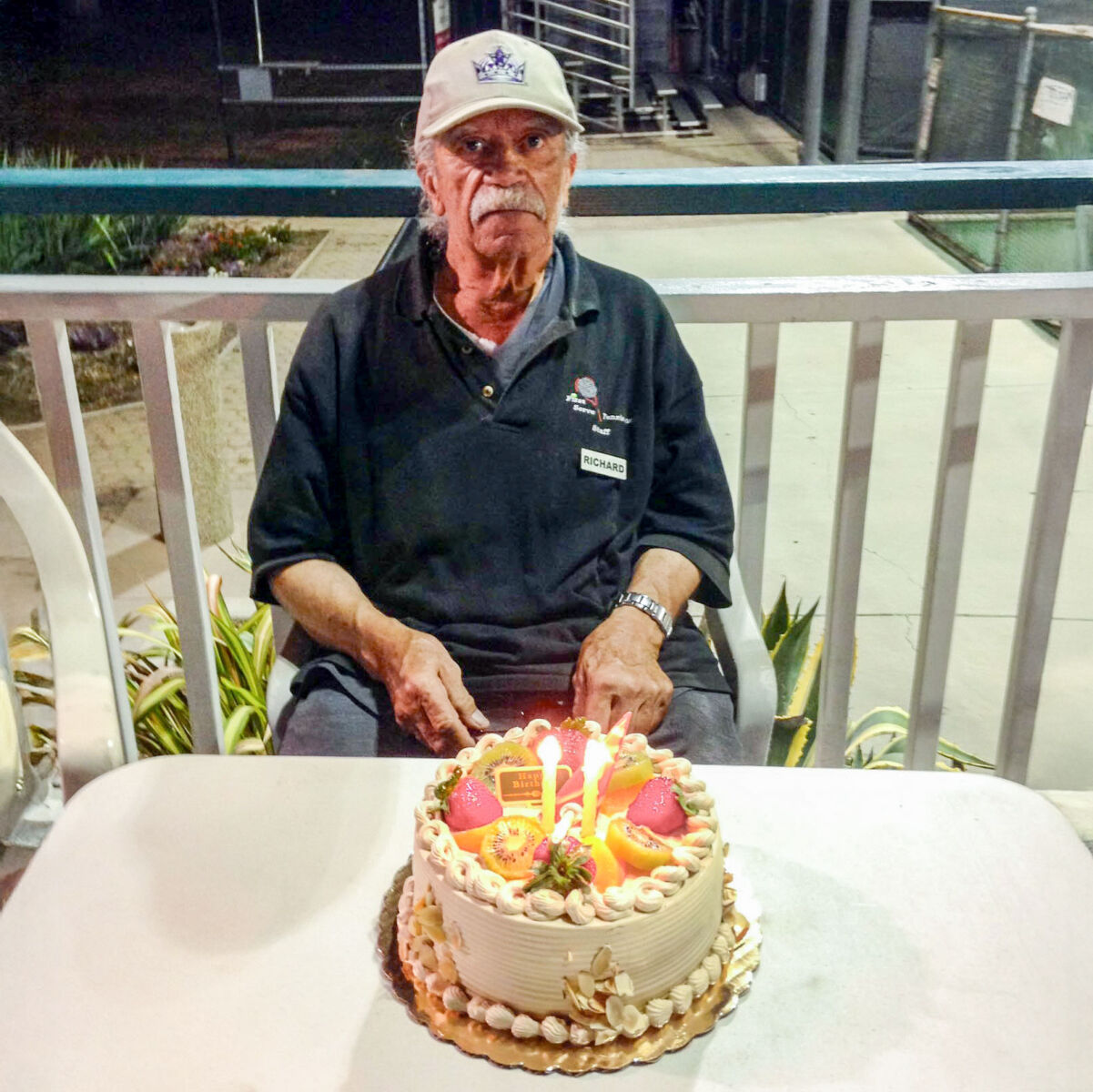 Richard Alston working at El Dorado Tennis Center and celebrating his birthday