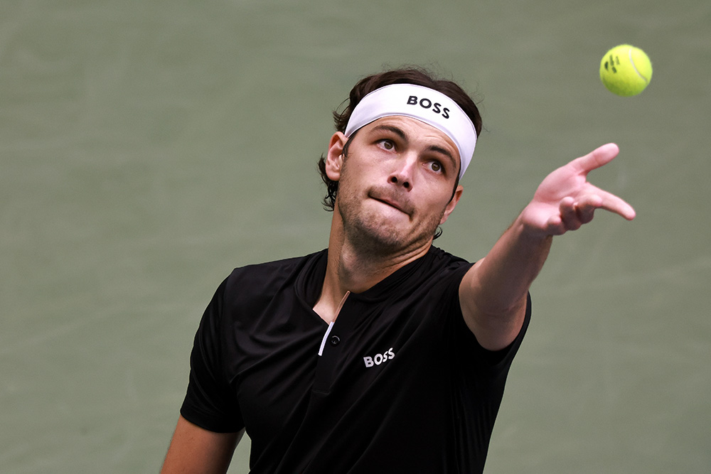 Taylor Fritz serves during a men's singles match at the 2024 US Open in Flushing, New York.