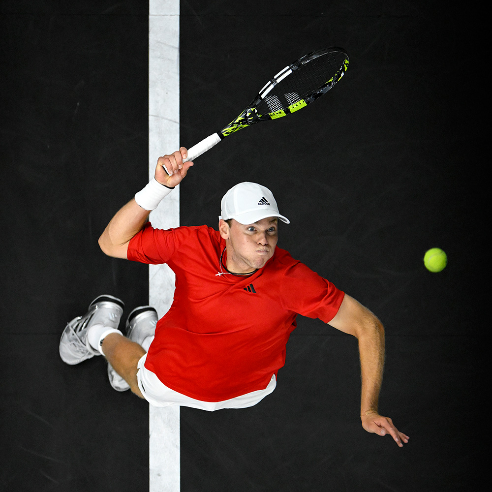 Alex Michelsen of Team World serves against Jakub Mensik of Team Europe during day one of Laver Cup 2025 at Chase Center, San Francisco.
