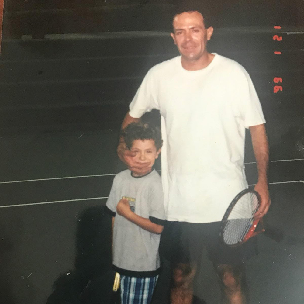 Ernesto Escobedo II and Ernesto Escobedo III playing tennis together
