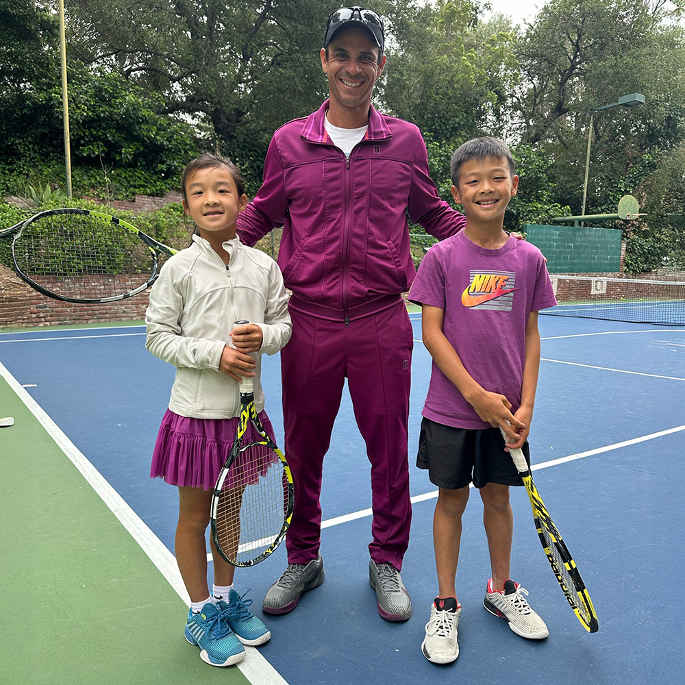 Lindy and William Zhou with their tennis coach