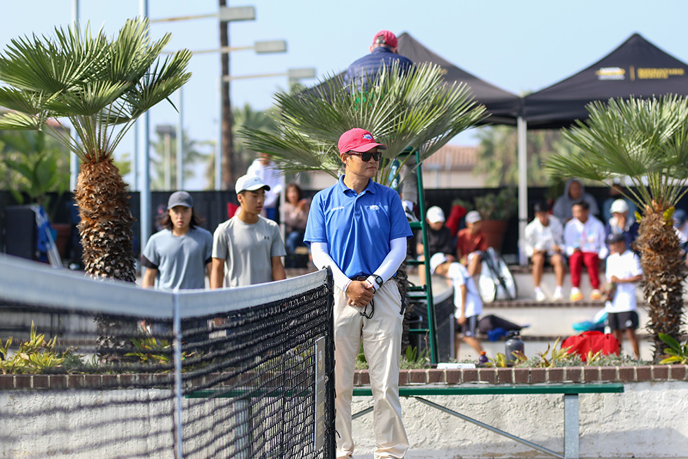 SangGyu Park in action officiating at a USTA Southern California Junior Doubles Sectionals.