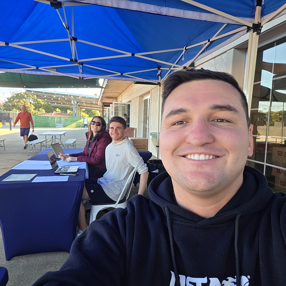 Evan Sonny working the USTA Southern California tennis tournament desk