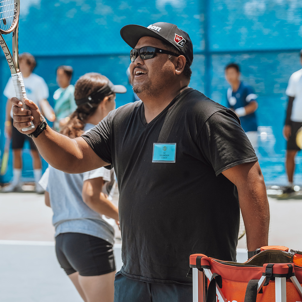 UJ Neri tennis coach