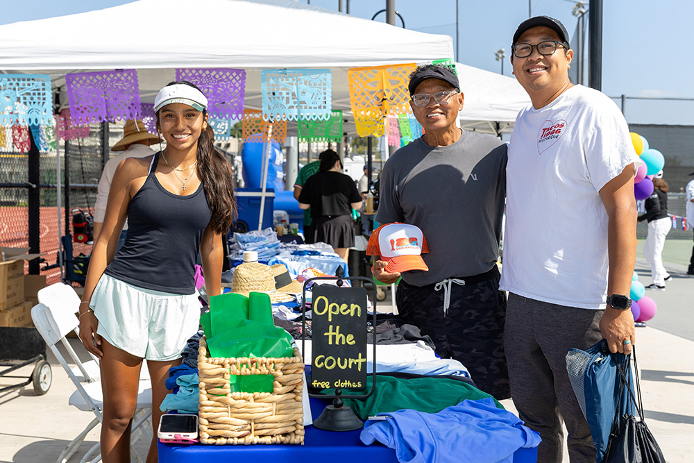 Ava Delgado volunteers at USTA Southern California’s Hispanic Heritage Month Celebration, distributing donated tennis gear through her Open The Court initiative.