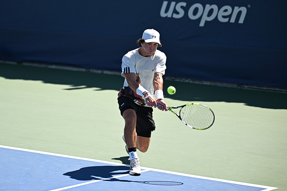 Keaton Hance hits a backhand during a junior boys' singles match at the 2025 US Open.