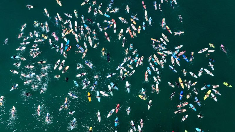 Hundreds of surfers gathered for a paddle out honoring Braun Levi